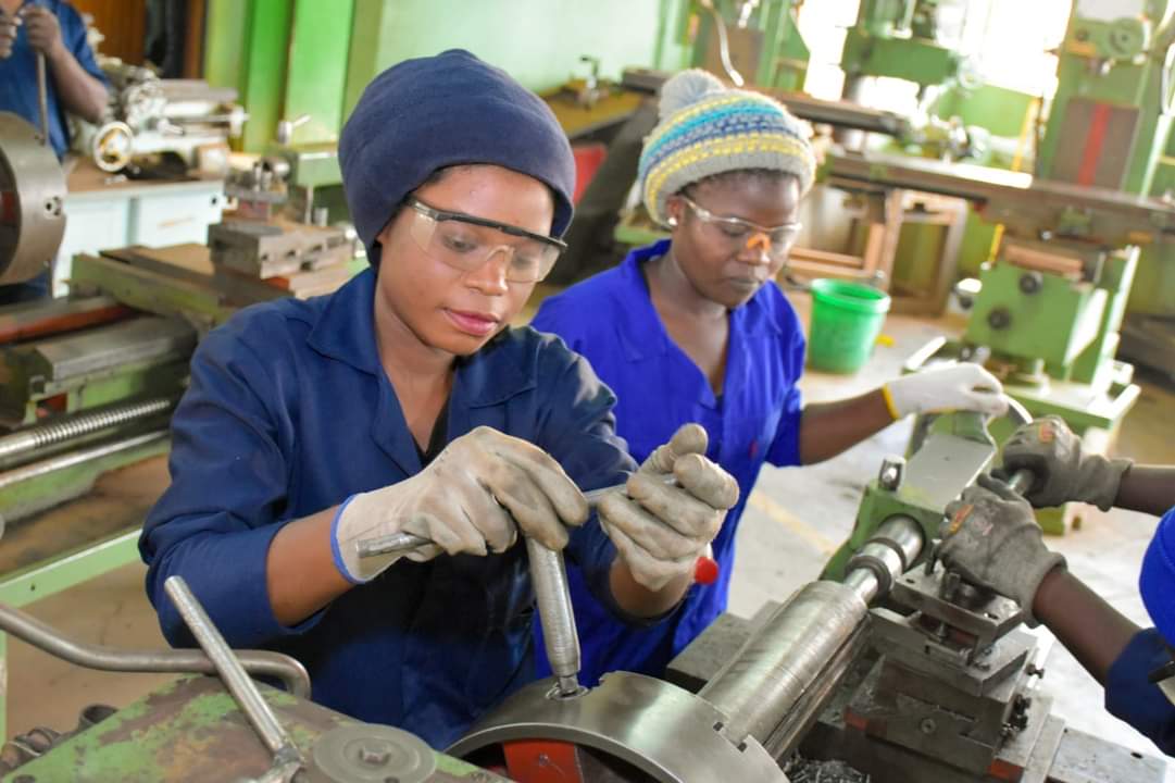 Students learning practical technical skills